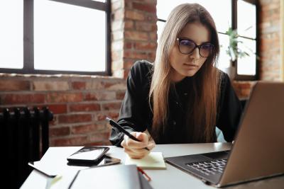 beautiful-young-woman-in-the-home-office-working-from-home-teleworking-concept