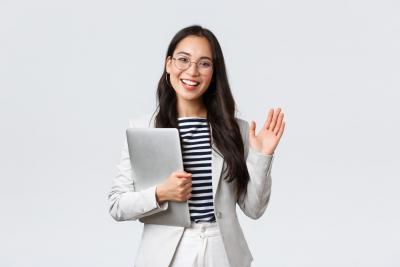 business-finance-and-employment-female-successful-entrepreneurs-concept-friendly-smiling-office-manager-greeting-new-coworker-businesswoman-welcome-clients-with-hand-wave-hold-laptop